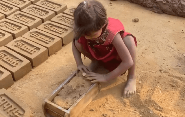 A child making bricks